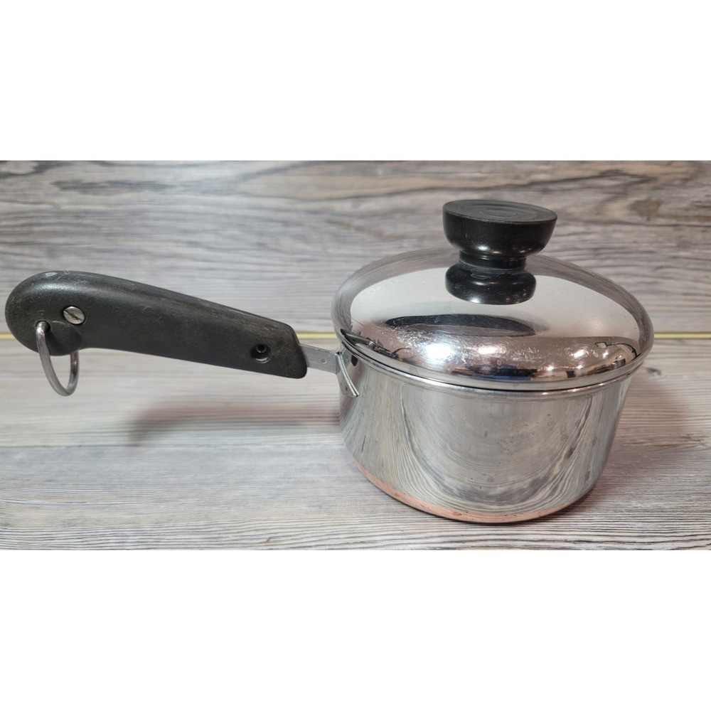 Vintage Revere Ware 3 cups Saucepan with Copper Bottom and Lid sits flat